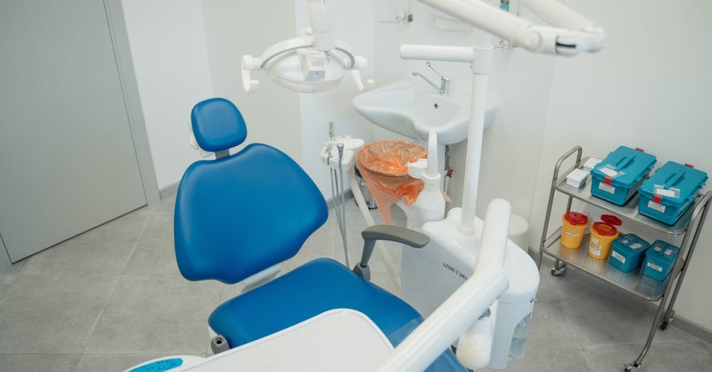 pexels photo 5355858 5355858 A clean and modern dental clinic featuring a blue dental chair, equipment, and sterile supplies.